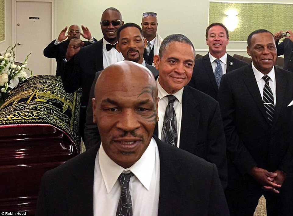 3523415400000578-0-Pallbearers_Tyson_front_Smith_and_Lewis_behind_are_pictured_prio-a-38_1465588804139.jpg