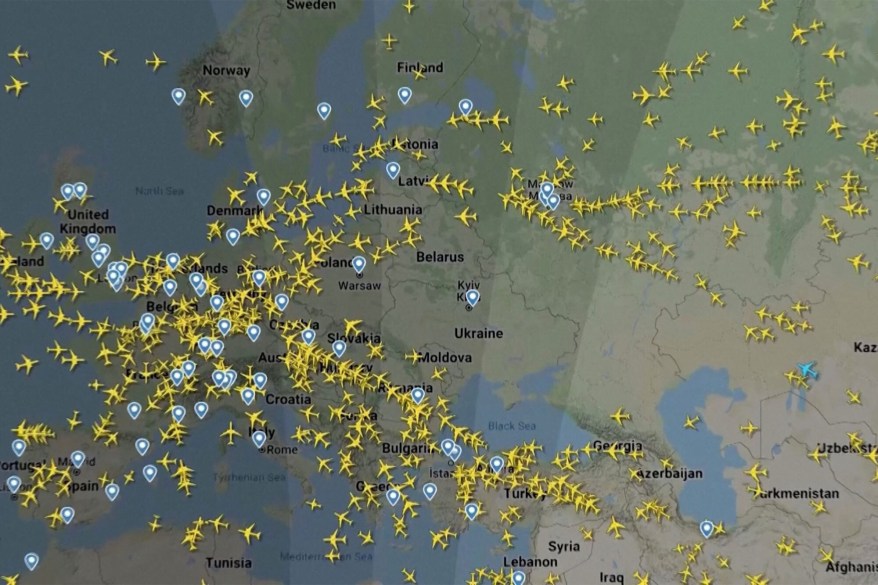 A screen recording of flight tracking website FlightRadar24 shows aircraft diverting around Ukraine