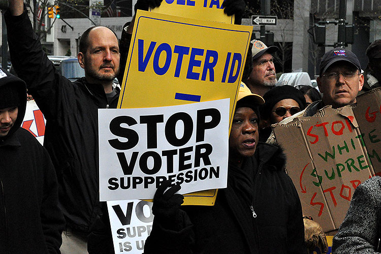 protesters link voter ID laws with vote suppression