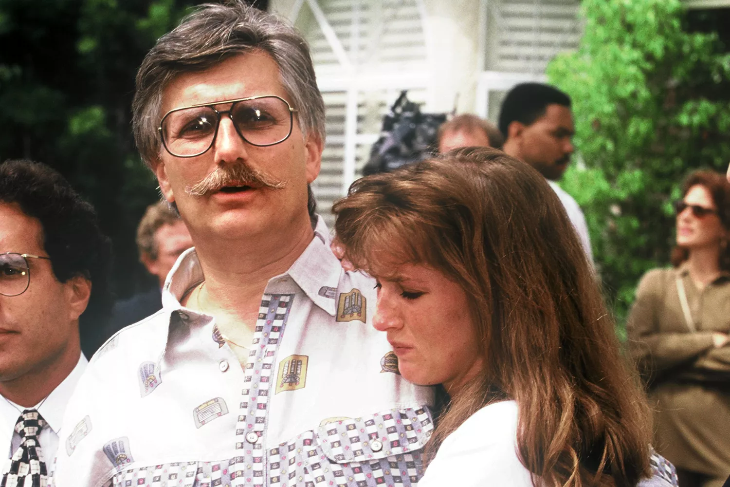 Fred and Kim Goldman, father and sister of Ronald Goldman, appear in front of the media June 15, 1994 at their home in Agoura Hills, CA, following the murder of Ronald and O.J. Simpson's ex-wife Nicole Brown Simpson.