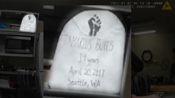 Video still of the tombstone for Damarius Butts, 19, seen in a Seattle police break room.