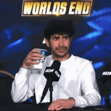 tony-khan-drinking.gif