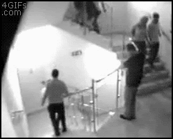 Drunk-falls-over-railing.gif