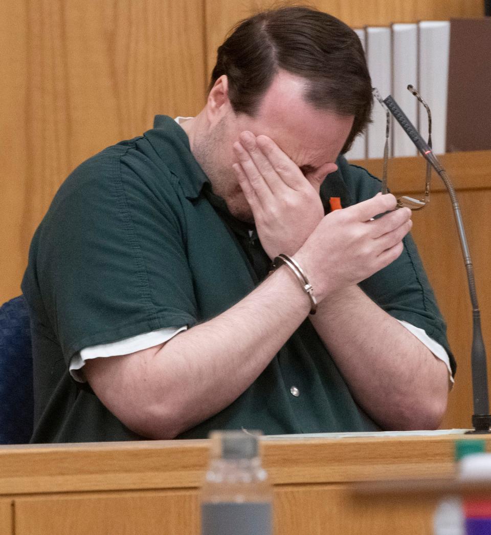 David Nims breaks down on the witness stand in the courtroom of Circuit Judge Coleman Robinson during his sentencing hearing on child porn and video voyeurism changes on Friday, Oct. 6, 2023.