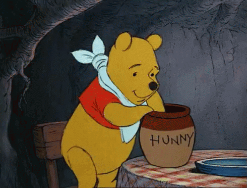 winnie-the-pooh-eating-hunny-gif.gif