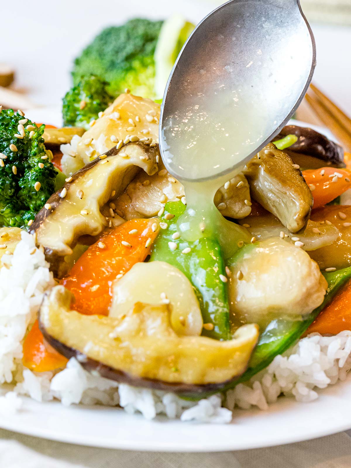 Chinese white sauce poured over stir fry