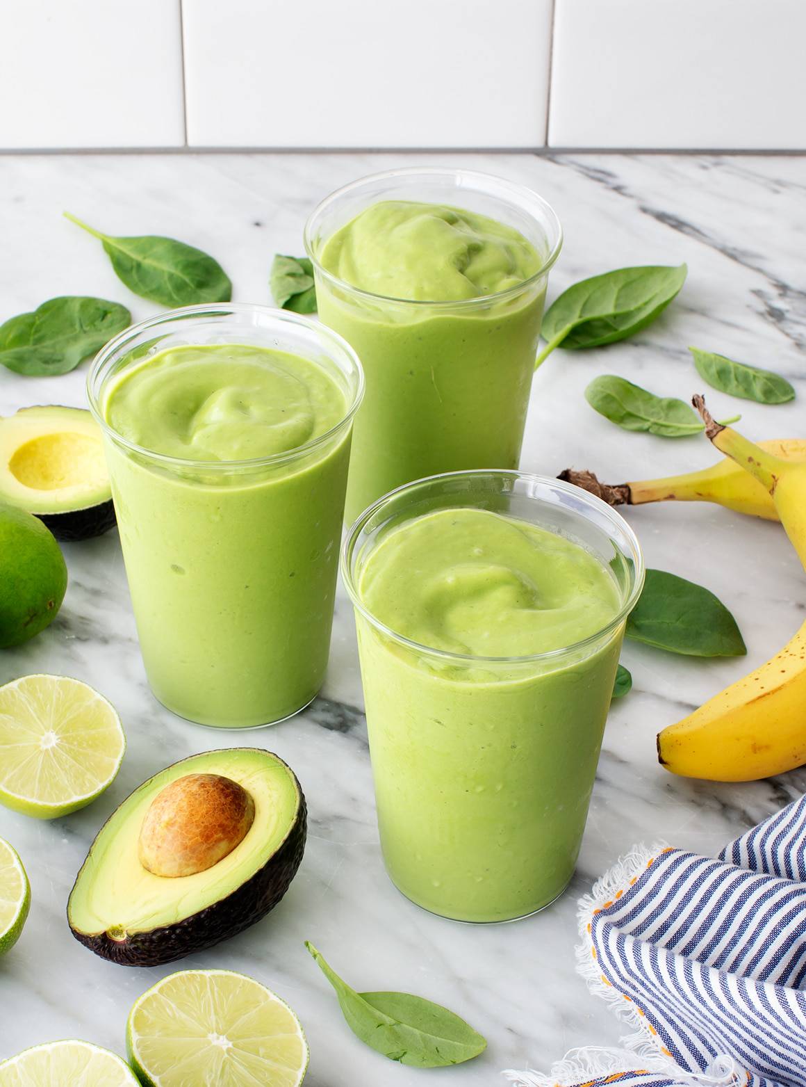 avocado smoothie in glasses