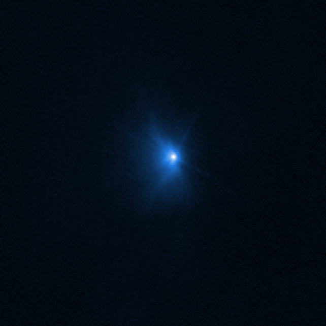 BlueTintedExplosionOfDARTMissionHubble.gif