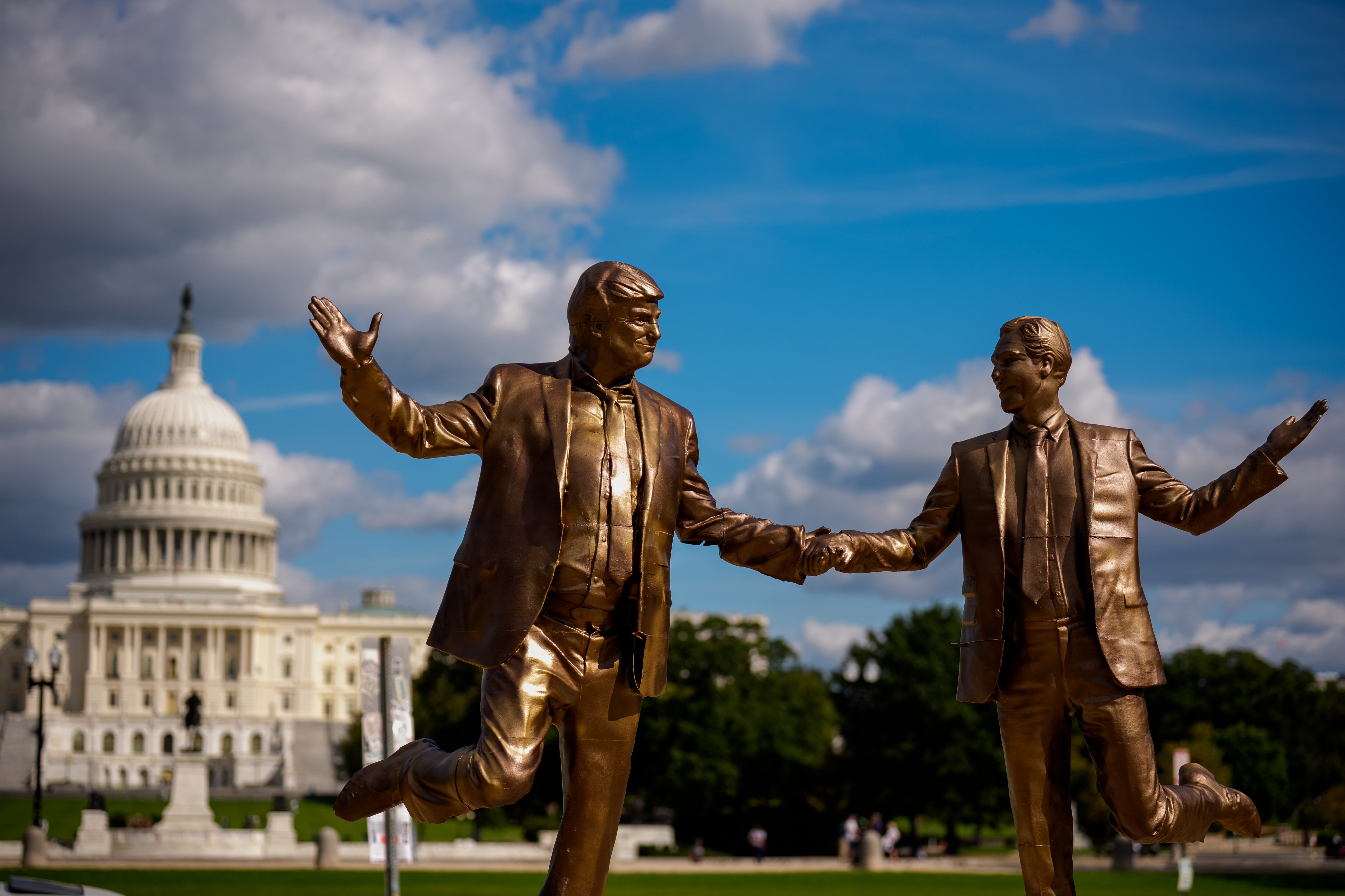 A golden statue of President Donald Trump and Jeffrey Epstein has made several appearances on Capitol Hill as Americans of all political stripes call for the files to be released