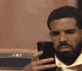 drake-sad-phone.gif