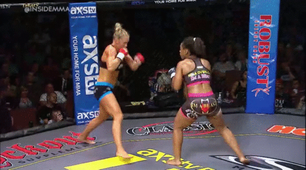 holly-holm-fucking-up-a-girl.gif