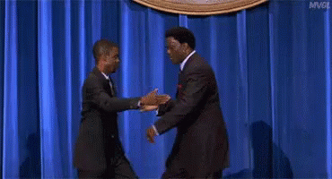 chris-rock-and-bernie-mac-hand-shake-3a3loh7czr0tukiy.gif