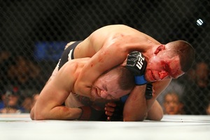 0307-mcgregor-diaz-fight14-300w.jpg
