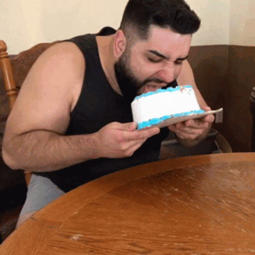 fat-man-eating-cake.gif