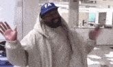 kanye-hands-up.gif