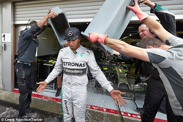 1408718005980_wps_10_Lewis_Hamilton_Ice_stunt_.jpg