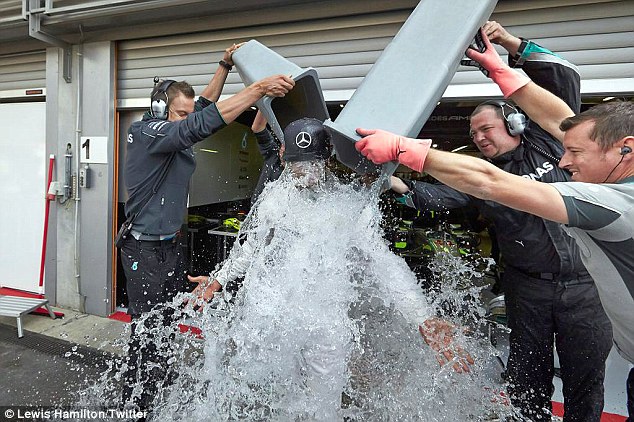 1408717997211_wps_9_Lewis_Hamilton_Ice_stunt_.jpg