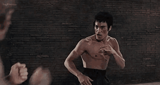bruce-lee-chuck-norris.gif
