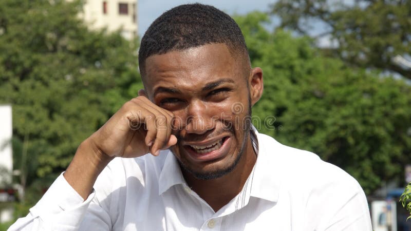 crying-african-person-handsome-young-black-man-107655120.jpg