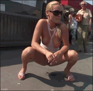 pissing-girl-kicked.gif