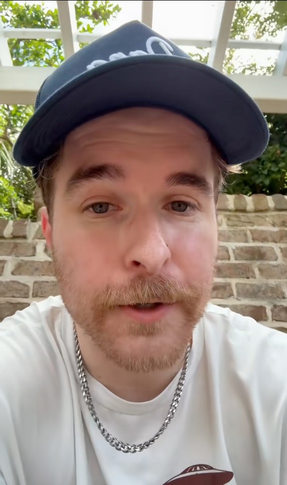 Close-up of a man speaking to the camera.
