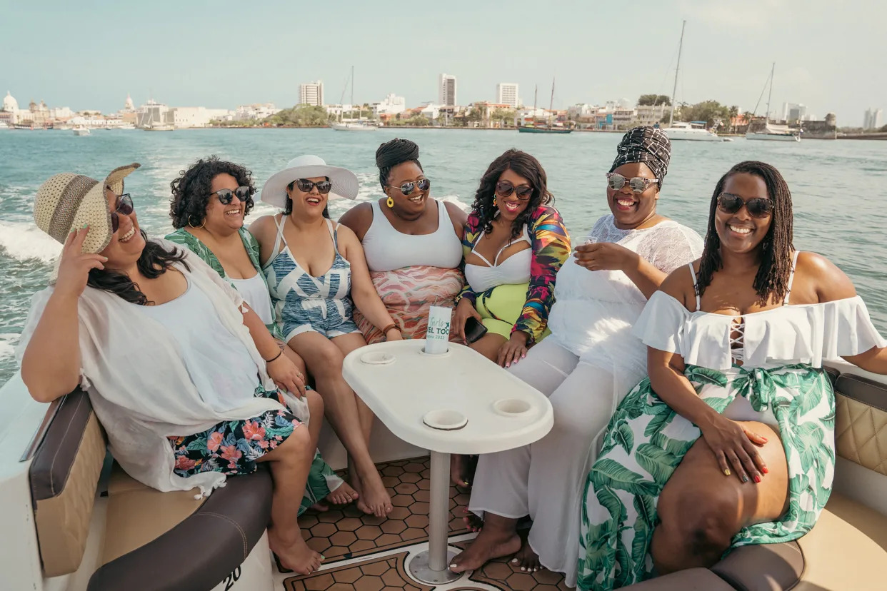 Natalie Robinson (third from right) of Fat Girls Travel, Too!, in Cartagena, Colombia. (Deon Tillman via The New York Times)