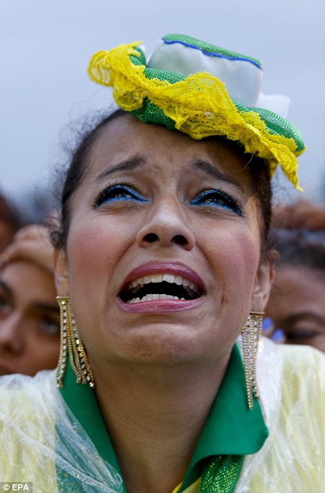 1404864499160_wps_34_epa04306209_Fans_of_Brazi.jpg