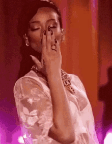 rihanna-kisses.gif