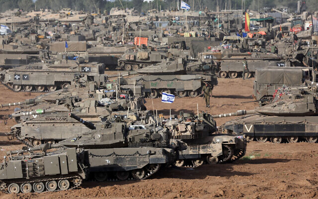 Illustrative - IDF tanks are positioned in southern Israel near the border with the Gaza Strip on May 9, 2024. (Ahmad Gharabli/AFP)