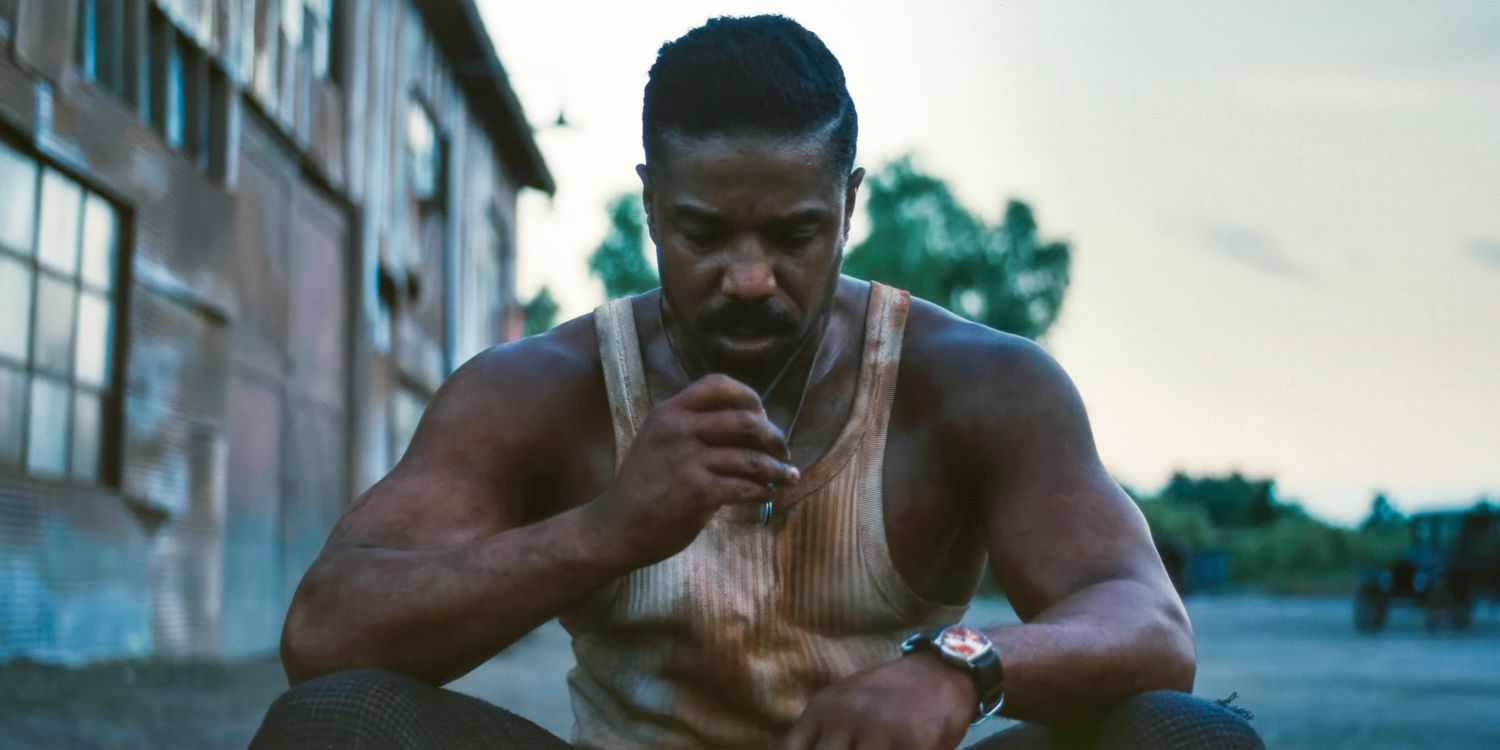Smoke (Michael B. Jordan) looking tired and covered in blood in Sinners
