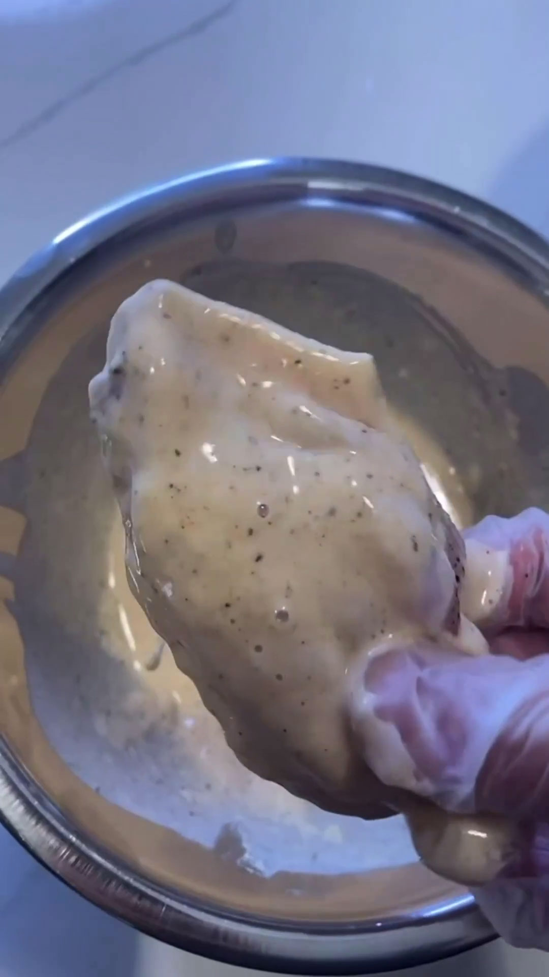 Chicken wings dredged in wet batter