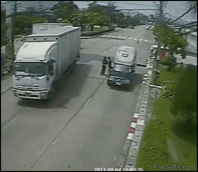 Truck-door-hits-bystander.gif