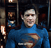 superman-eyes-up-here.gif