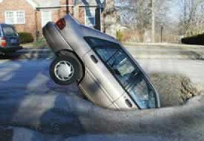 car+in+pothole.jpg