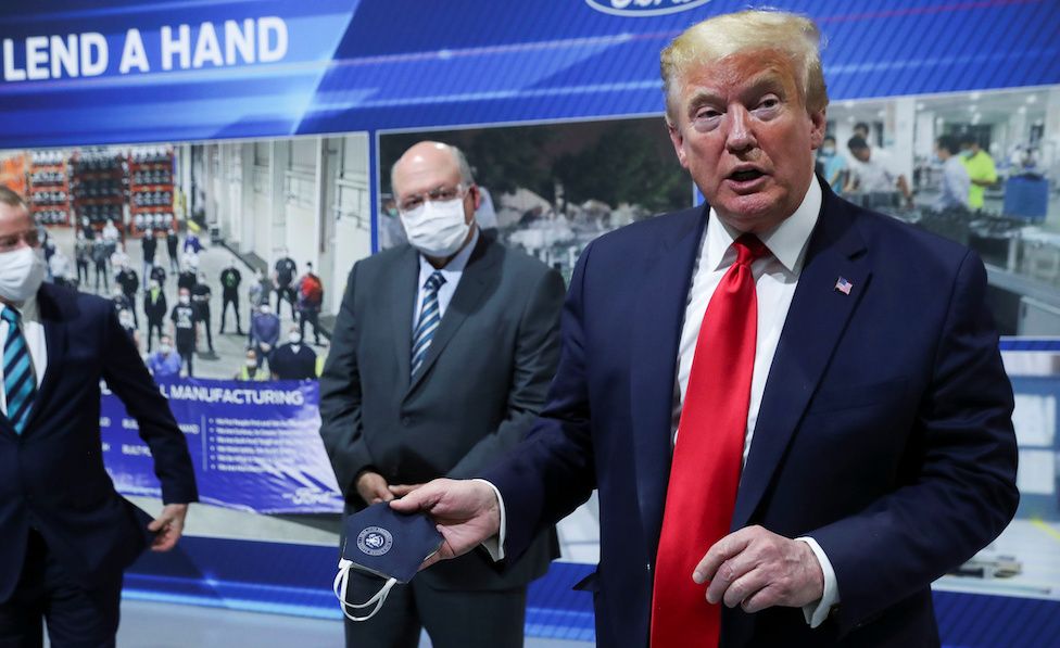 Trump tours a Ford automobile factory that has switched to making ventilators and other supplies