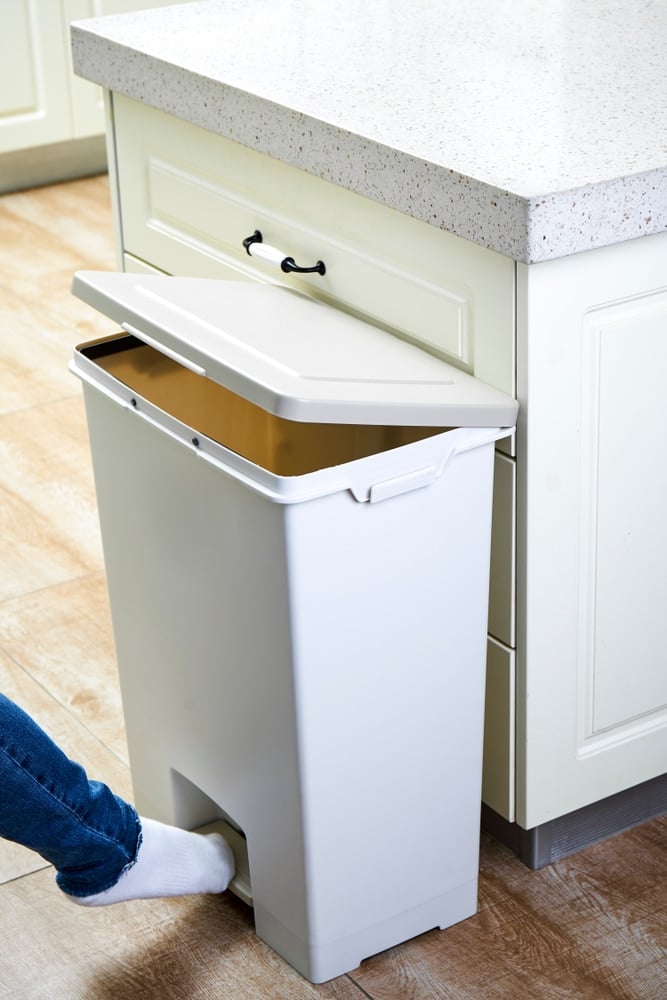 Use Dryer Sheets to prevent Smells from Trash Can