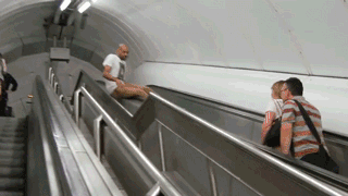 thisclownhereonescalator0.gif
