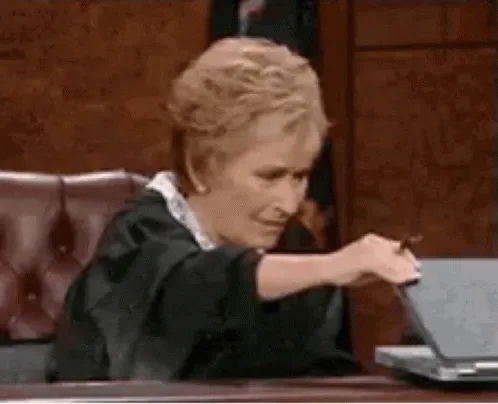 judge-judy-slowly-closing-laptop-bho8hwnc3n1yavg6.webp