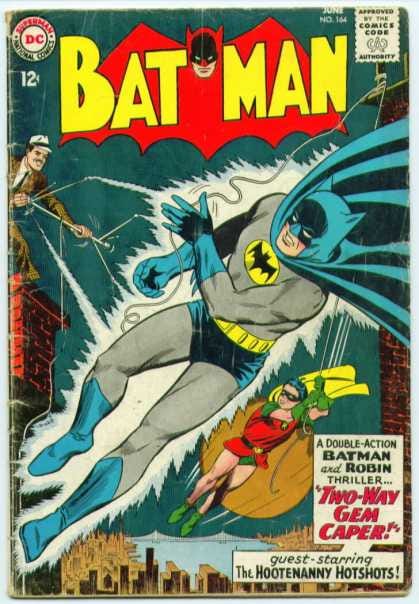 1960s-silver-age-batman-the-comics-added-the-gold-oval-to-his-1940s-golden-age-counterpart.jpg