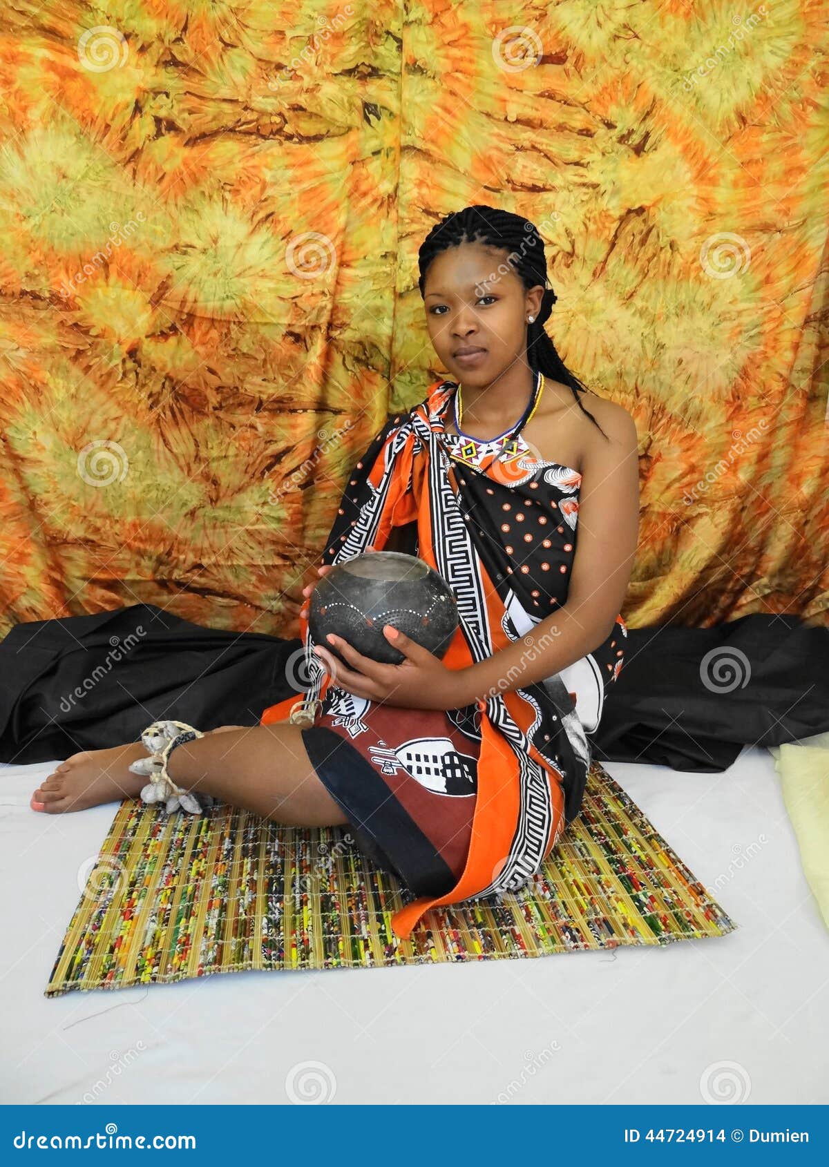 swazi-woman-half-cut-posing-sitting-44724914.jpg