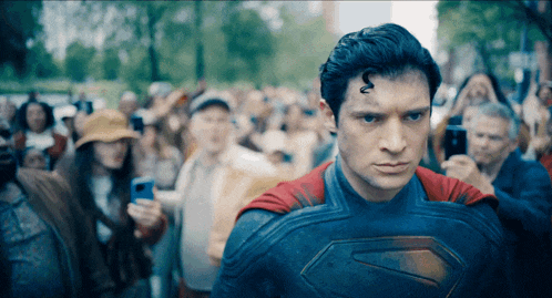 superman-superman-hit-with-can.gif