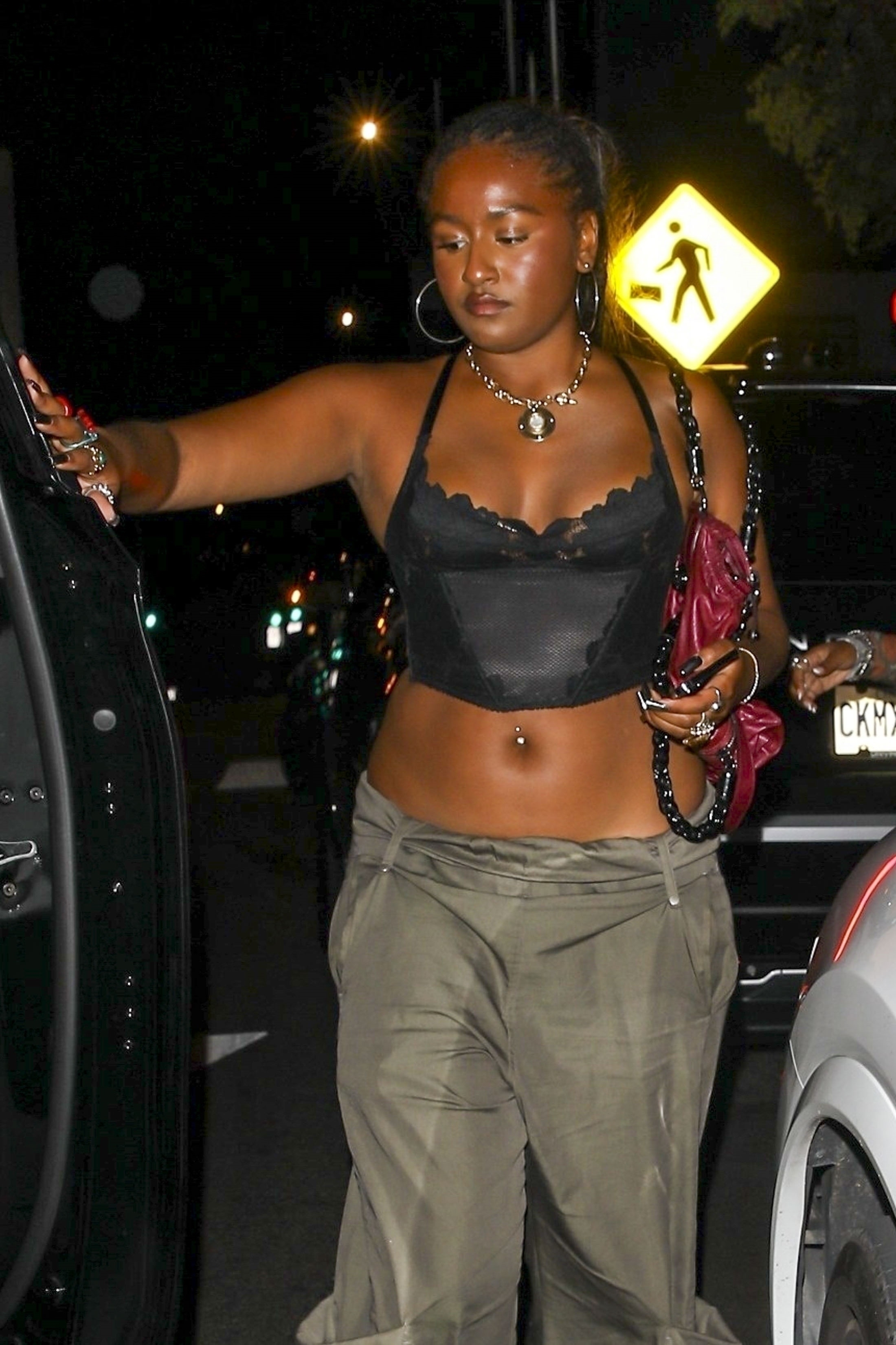 Sasha Obama opening a door