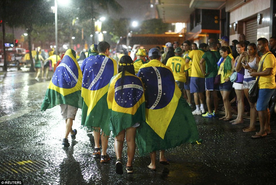 1404866009899_wps_47_Brazil_soccer_fans_walk_i.jpg