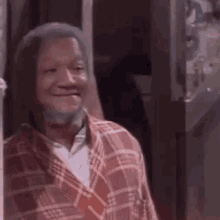 Fredlookingaroundsmiling.gif