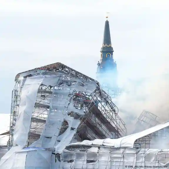 Plumes of smoke billow from the historic Boersen stock exchange building 