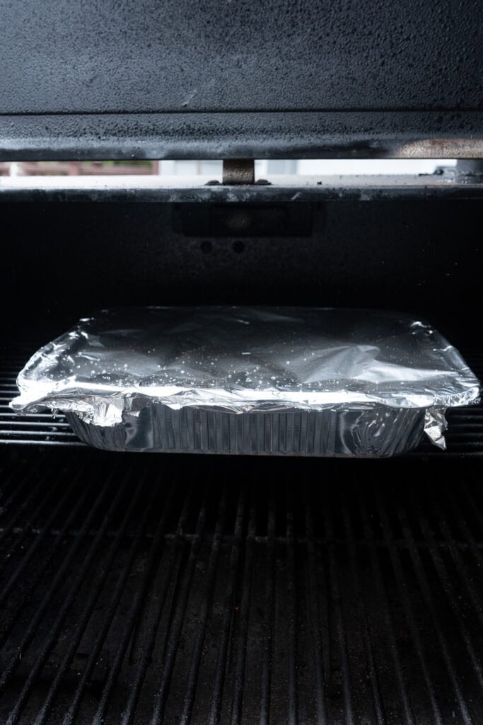 Foil pan on smoker.