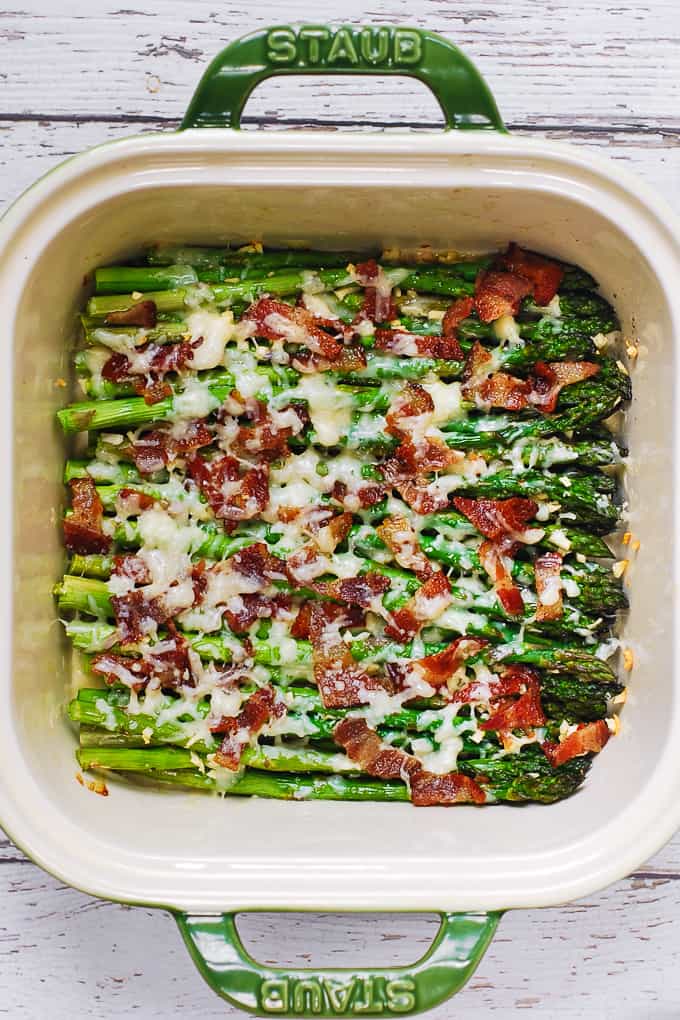 Cheesy Baked Asparagus with Bacon in a baking dish