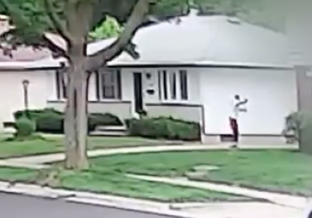 Surveillance video still image of a child abduction.