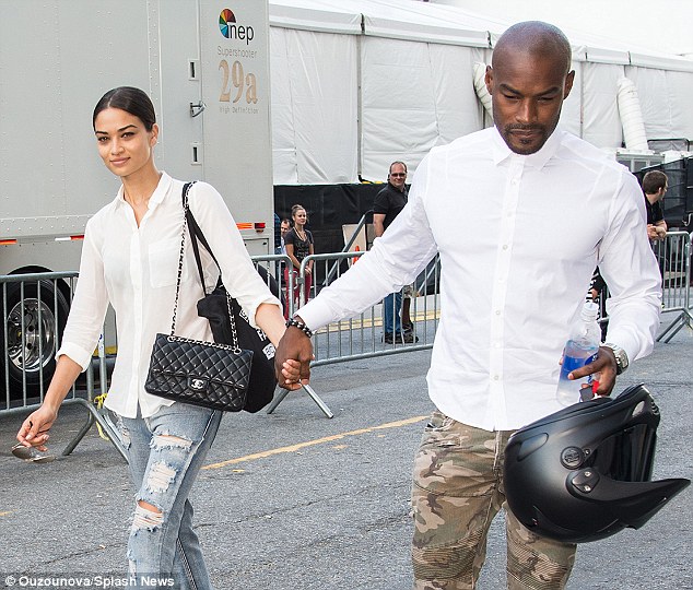 1414798881029_Image_galleryImage_Tyson_Beckford_and_Shanin.JPG