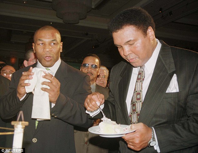 1415195536763_wps_13_MUHAMMAD_ALI_CELEBRATES_H.jpg